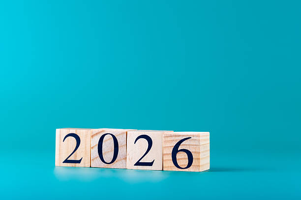 istock Wooden blocks with number 2026 placed in slight diagonal on turquoise blue minimalist background. Copy space. Concept of new year, business and planning 2234973028