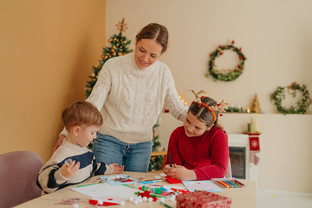 istock Signing Christmas cards together 2234979244