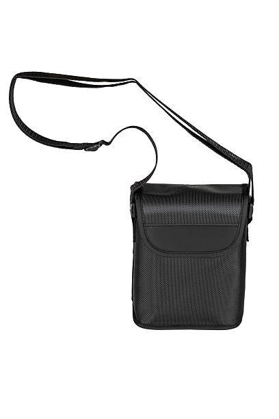 istock A compact black shoulder bag made of a durable, textured fabric with an adjustable strap. 2234979432