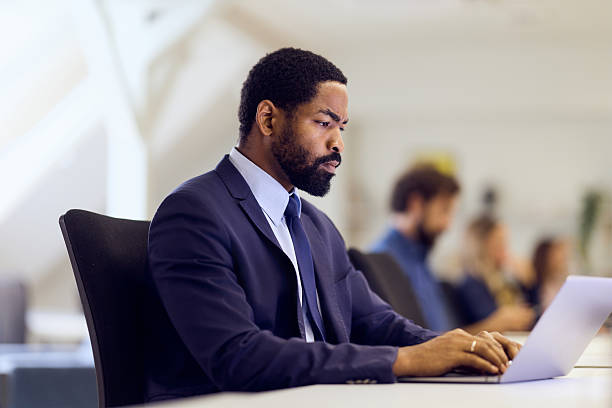 istock African American Man Working on a Laptop in Office Workspace 2234980073