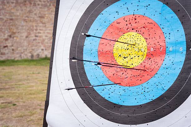 istock Archer hitting bullseye, demonstrating skill during competitive archery event 2234981290