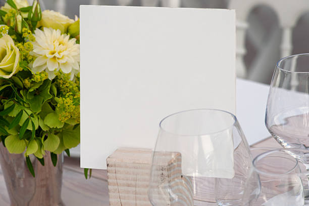istock Elegant Table Setting with Blank Card and Flower Arrangement 2234983485