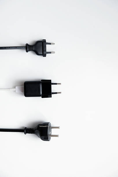 Various kinds of power adapters isolated on white background