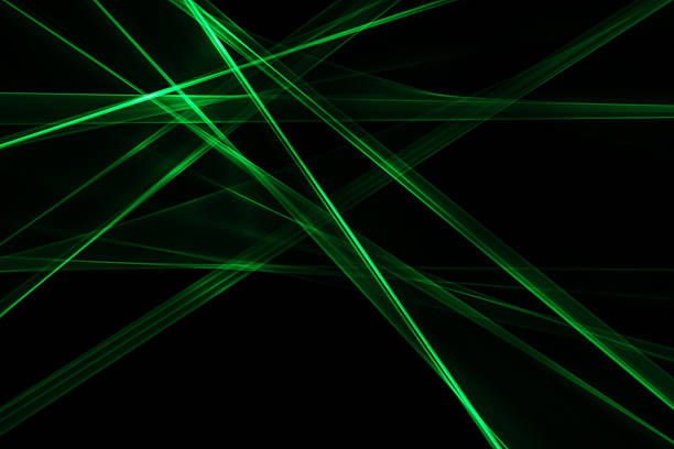 istock laser light green. streaks of light rippling and twisting 2234984319