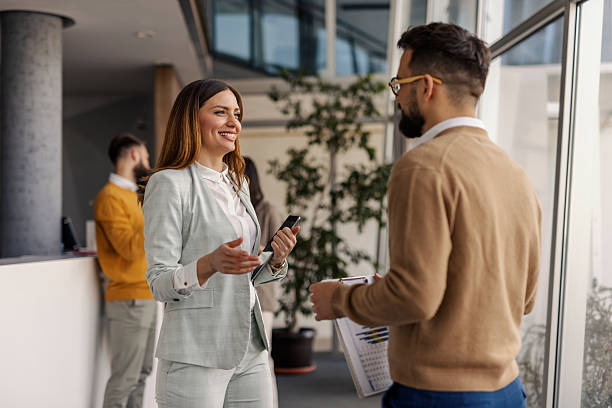 istock Professional Business Meeting Between Colleagues in Modern Office Setting with Friendly Interaction 2234988450