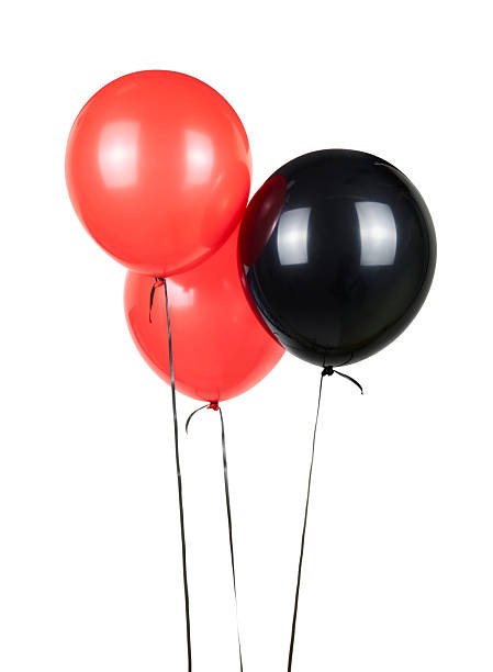 istock red and black balloons isolated on white 2234992070