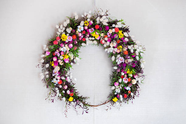 A Christmas wreath made with dried flowers.