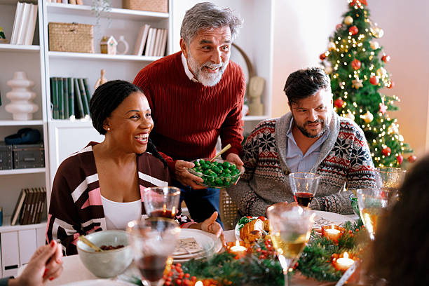 istock Grandfather Serving Christmas Dinner 2234993508