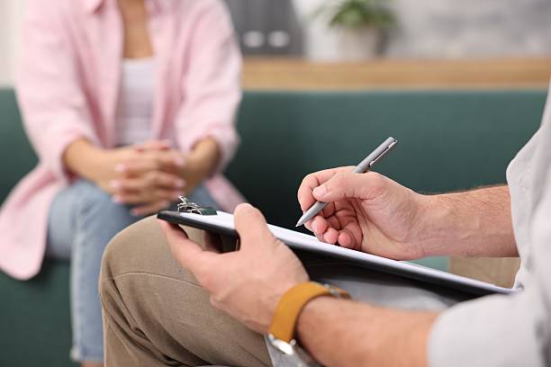 istock Professional psychologist working with patient in office, closeup 2234995447