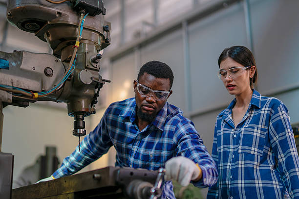 istock Blue collar workers are working at machine shop. 2234996460