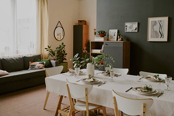 istock Modern Dining Room Table Setting with Elegant Decor in Contemporary Apartment 2234997362