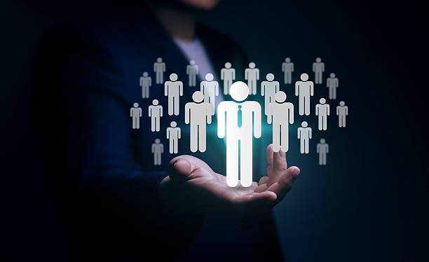 istock Recruitment concept, human resource management (HRM) and leadership. Virtual human icon on businessman's hand. 2234998511