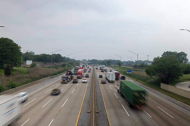 istock Busy Highway with Passing Traffic on Overcast Day 2234999254