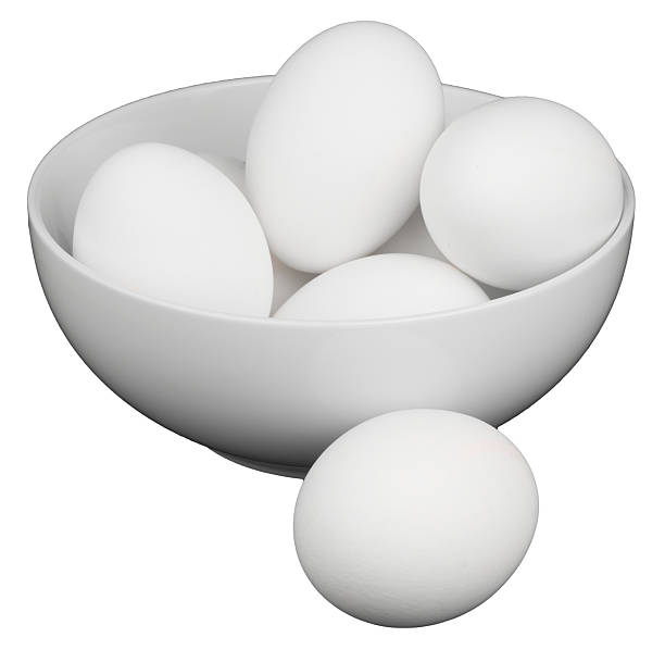 istock Eggs in a bowl isolated on white background 2235000307