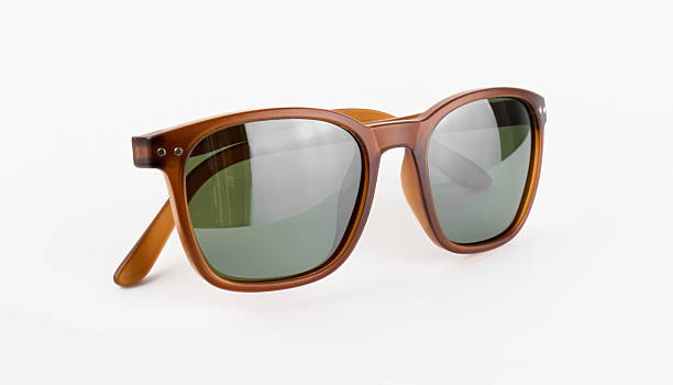 istock Stylish sunglasses with dark lenses isolated 2235007406