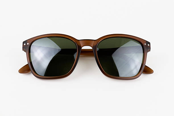 istock Stylish sunglasses with dark lenses isolated 2235007542