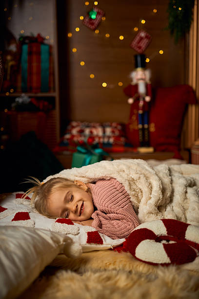 istock A toddler dreaming of Christmas magic 2235010793