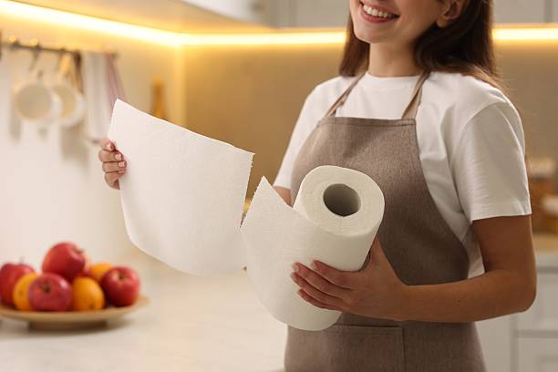istock Woman using paper towels in kitchen, closeup 2235011771