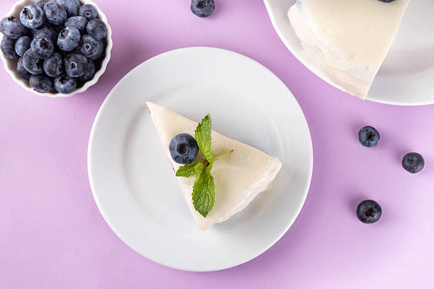 istock Tasty berry layered mousse tart cake with blueberries 2235014079