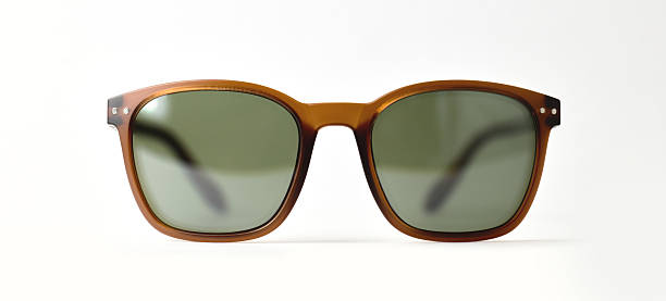 istock Stylish sunglasses with dark lenses isolated 2235014513