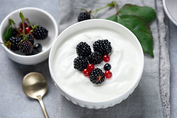 istock Greek yogurt with blackberries 2235025714