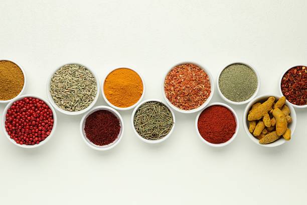 istock Different aromatic spices and herbs on white background, flat lay 2235027108