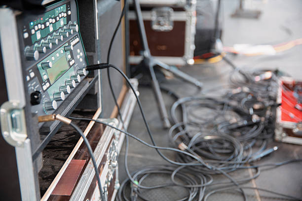Bunch of old RCA connection cables and adapters in a musical system