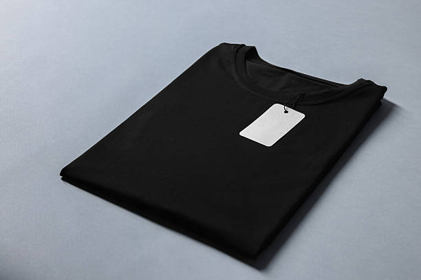 istock Blank black t-shirt on grey background. Mockup for design 2235031930