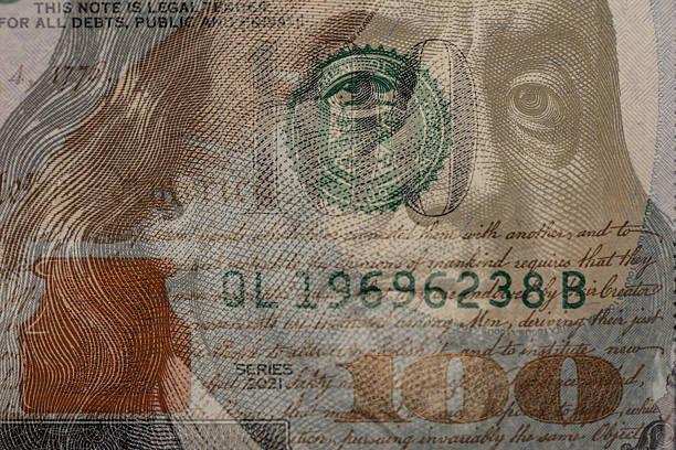 istock Double Exposure of One Hundred Dollar Bills 2235032070