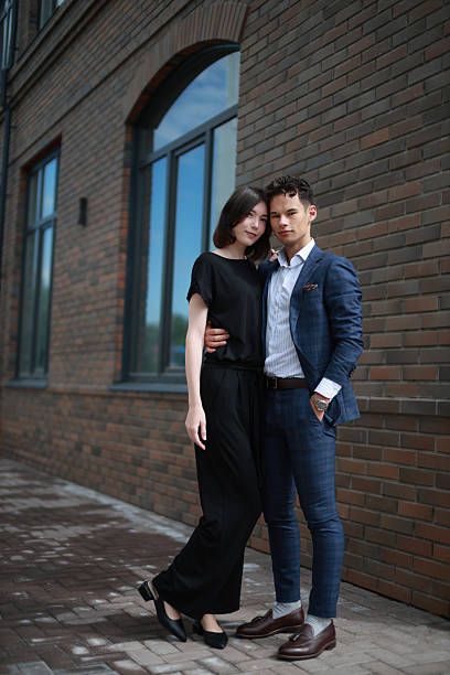 istock Elegant young Couple Posing Near Brick Building 2235035232