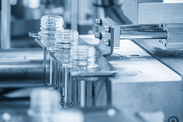 istock Close up scene the plastic bottle preform shape on the conveyor belt. 2235036531