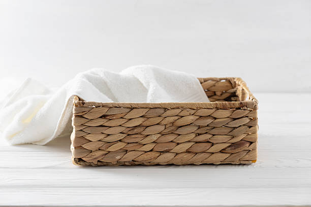 istock Straw basket decorated with white towel empty advertisement space, container, promotional display. Showcase. 2235036929