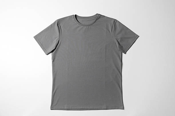 istock One blank t-shirt on white background, top view. Mockup for design 2235039439
