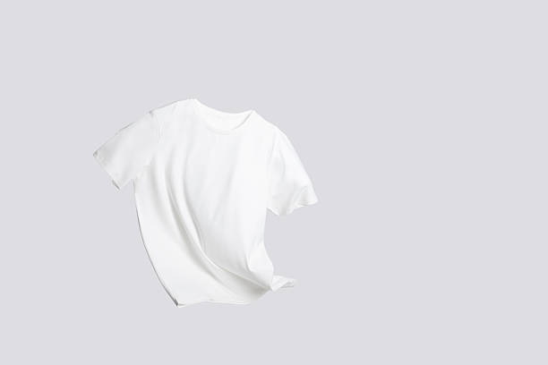 istock One stylish t-shirt in air on white background 2235039746