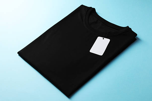 istock One blank t-shirt on light blue background, closeup. Mockup for design 2235039829