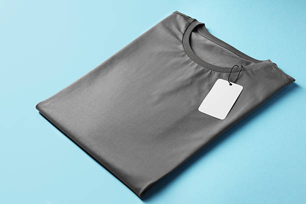 istock One blank t-shirt on light blue background, closeup. Mockup for design 2235039997