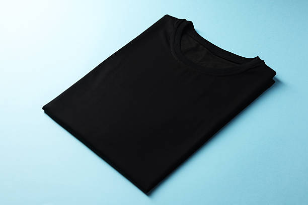 istock One blank t-shirt on light blue background, closeup. Mockup for design 2235040068