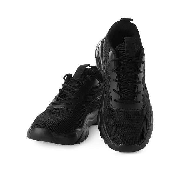 istock Pair of black sneakers isolated on white 2235040507