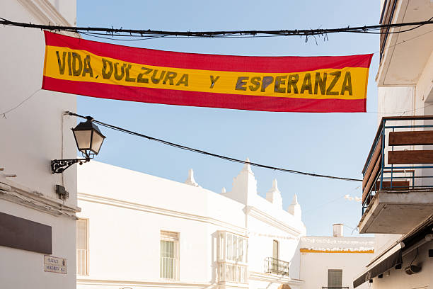 istock Conil de la Frontera, Cadiz, Andalusia, Spain. 6 September 2025. Whitewashed building with festival decorations 2235048442