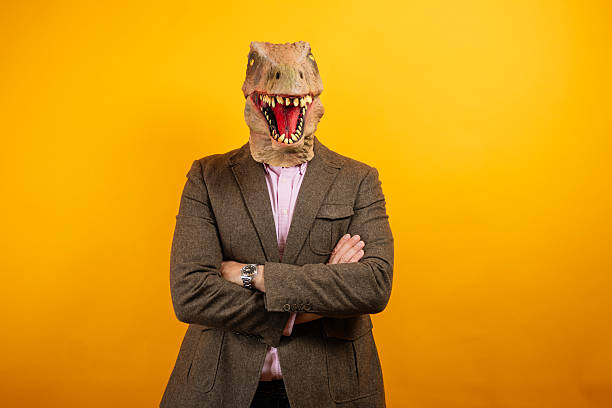 istock Dinosaur head businessman with arms crossed 2235048747