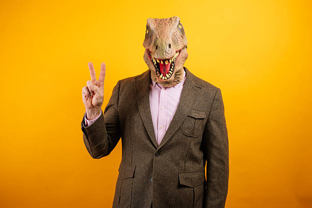 istock Dinosaur masked man giving thumbs up 2235048772
