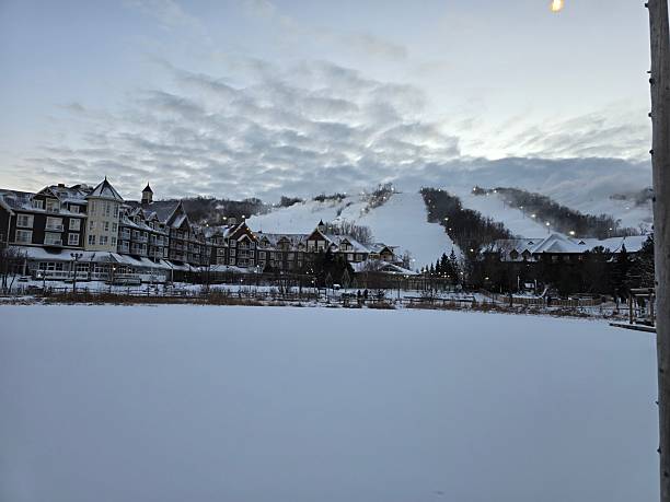 istock Winter Resort and Ski Slopes at Sunset 2235050084