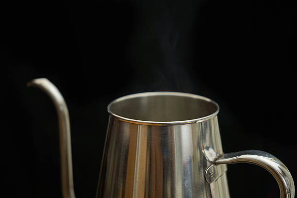 istock Steam rising from the boiling water in the drip kettle. 2235052295