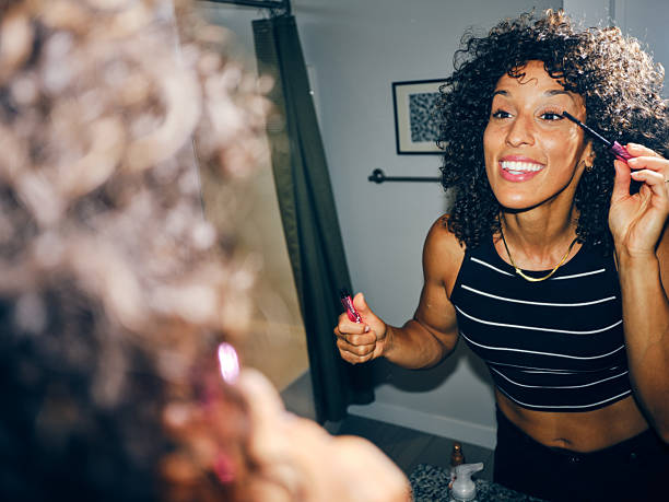 istock Woman Putting on Makeup 2235057138