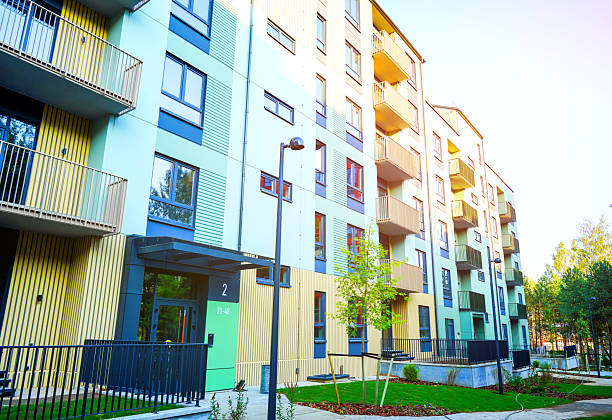istock New Apartment facade. Modern residential facade with balcony, windows. 2235059444