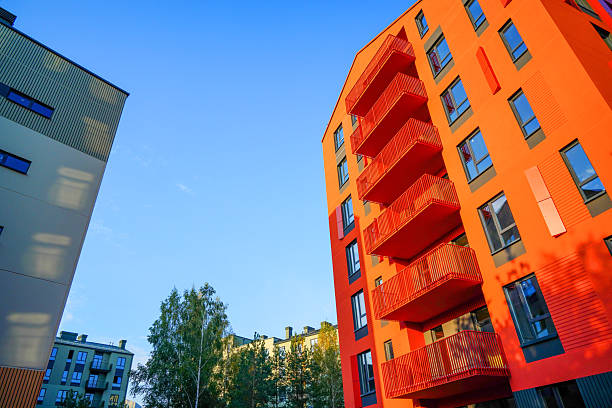 istock New Apartment facade. Modern residential facade with balcony, windows. 2235060118