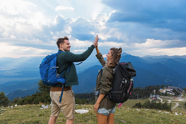 istock Happy hikers celebrate in the mountains 2235061814