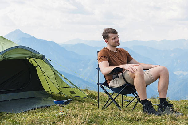 istock Relaxing in a mountain campsite during the day 2235063848