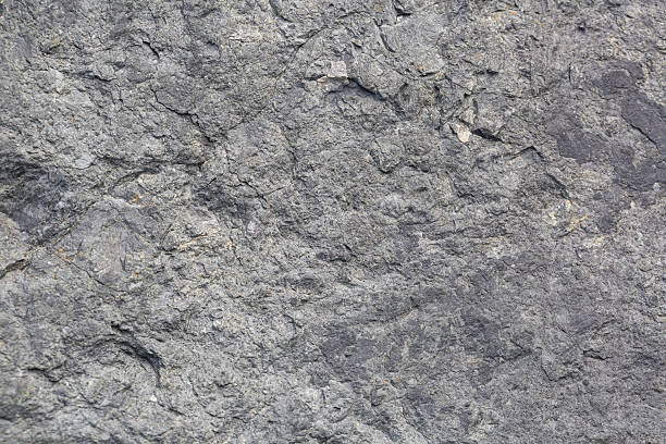 istock Close-up macro gray stone texture,Dark rough natural rock texture background. 2235064310
