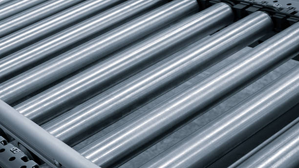 istock Crossing of roller conveyor, Production line conveyor roller transportation objects, industry concept background 2235067283